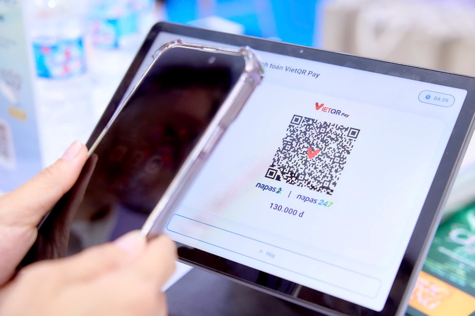 A person holding a phone and scanning qr code  AI-generated content may be incorrect.