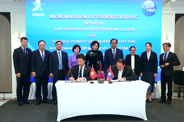 NAPAS signed MOU for Bilateral Retail Payment Connections via QR Codes Between Vietnam and Laos- Ảnh 2.