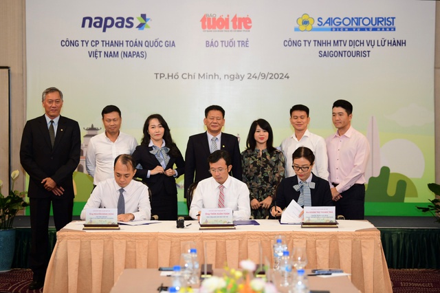 NAPAS, Saigontourist and Tuoi Tre News sign a cooperation agreement to promote NAPAS card spending in Korea.- Ảnh 1.