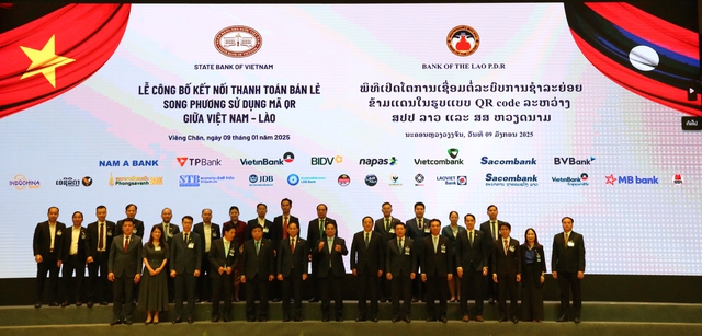 Ceremony to announce the bilateral retail payment service using QR codes between Vietnam and Laos - Ảnh 2.